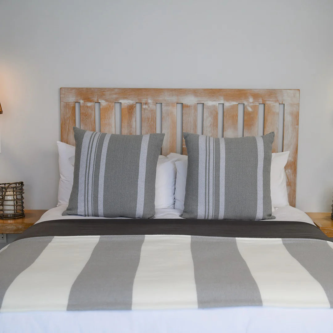 A Melody Mariner throw, elegantly spread across a neatly made bed, showcasing its soft texture and nautical-inspired design. Ideal for creating a cozy, sophisticated ambiance in any lodge or guesthouse. #LodgeLuxury #HotelComfort #PremiumBlankets #GuestSatisfaction #HospitalityExcellence